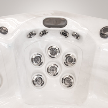 Jets inside a hot tub with radiating areas showing the therapy system.