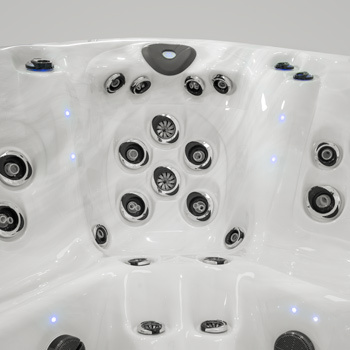 Radiating waves of energy coming from jets on a hot tub.