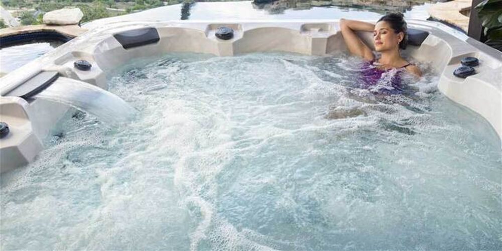 Relaxing in a Legacy Series hot tub.